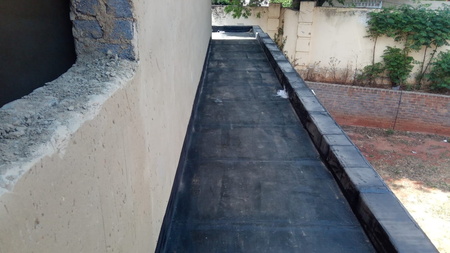 Torch-on membrane waterproofing applied to an Edenvale balcony